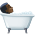 🛀🏿 person taking bath: dark skin tone display on Facebook